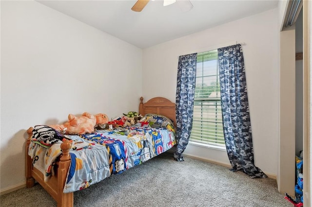 8752 Leisure Dr, Denham Springs, LA 70726 - carpeted bedroom featuring baseboards and ceiling fan
