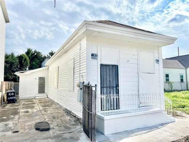 view of outdoor structure with fence