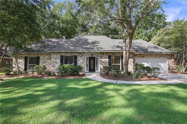 ranch-style house with roof with shingles, driveway, a front yard, and a garage