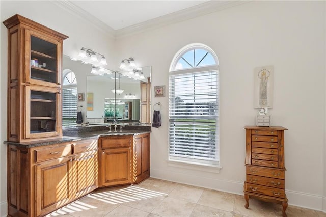 30222 N Dixie Ranch Rd, Lacombe, LA 70445 - full bathroom with vanity, ornamental molding, tile patterned floors, and baseboards