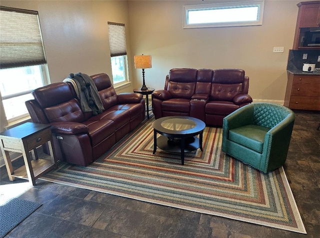 living room with stone finish floor
