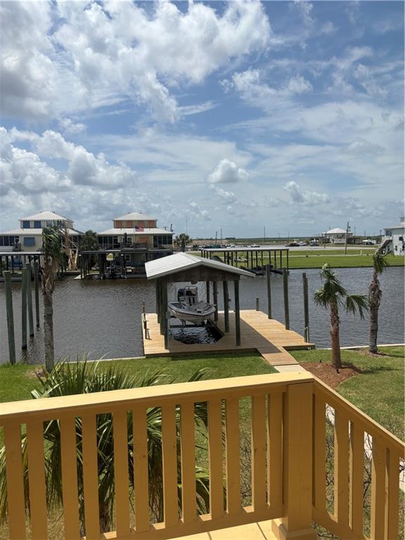 view of water feature featuring a boat dock and boat lift