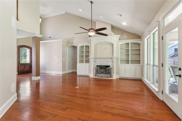 unfurnished living room with ceiling fan, high vaulted ceiling, baseboards, a fireplace with flush hearth, and visible vents