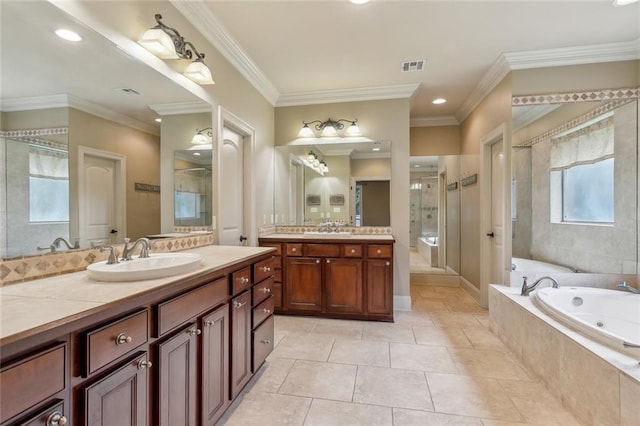 full bathroom featuring visible vents, a sink, a whirlpool tub, and a stall shower