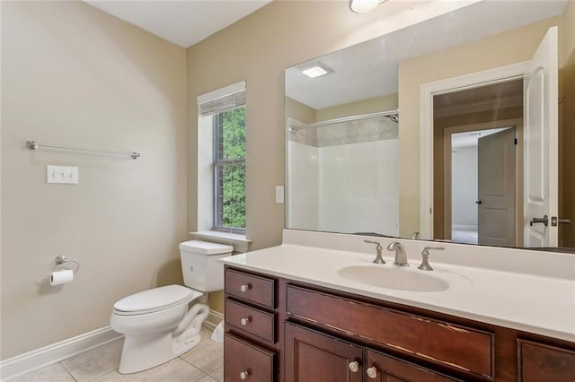 full bathroom with walk in shower, vanity, baseboards, tile patterned floors, and toilet