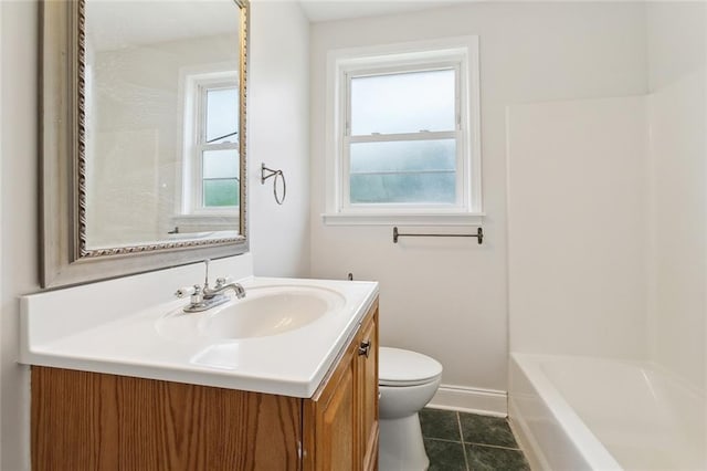 full bath with toilet, baseboards, tile patterned flooring, and vanity