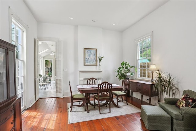 dining area with recessed lighting, baseboards, ceiling fan, and hardwood / wood-style flooring
