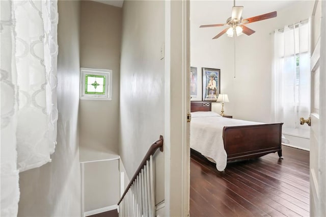 bedroom featuring a ceiling fan and hardwood / wood-style flooring