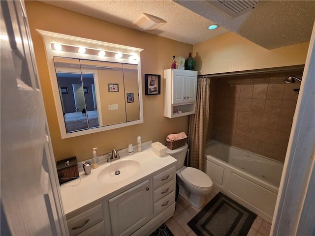 full bath with tile patterned flooring, vanity, shower / tub combo with curtain, toilet, and a textured ceiling