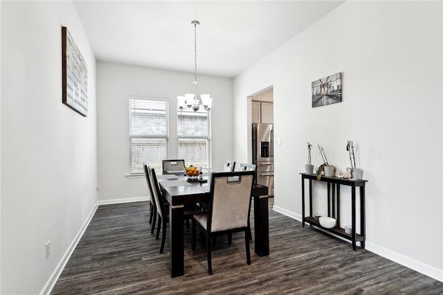 dining room featuring baseboards, an inviting chandelier, and dark wood-style floors