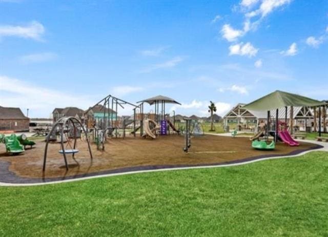 communal playground with a lawn