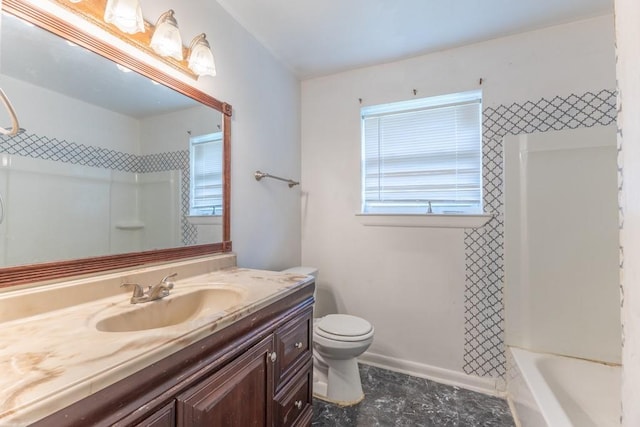 full bath with vanity, baseboards, and toilet