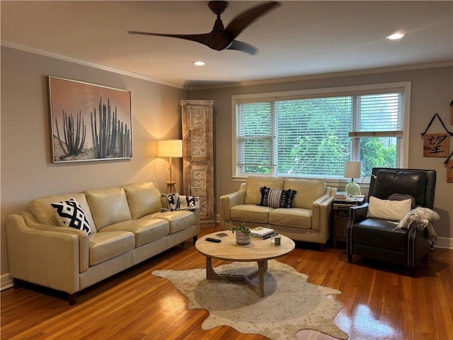 101 W William David Pkwy Unit D, Metairie, LA 70005 - living area with crown molding, a ceiling fan, and wood finished floors