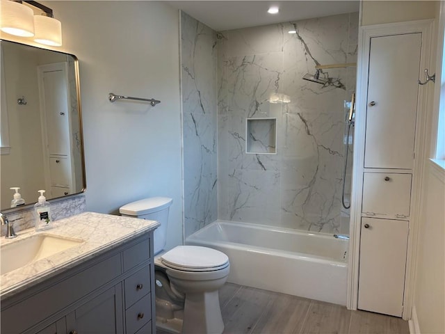 101 W William David Pkwy Unit D, Metairie, LA 70005 - full bath with vanity, toilet, shower / tub combination, and wood finished floors