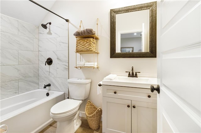 full bathroom with toilet, shower / bath combination, vaulted ceiling, and vanity