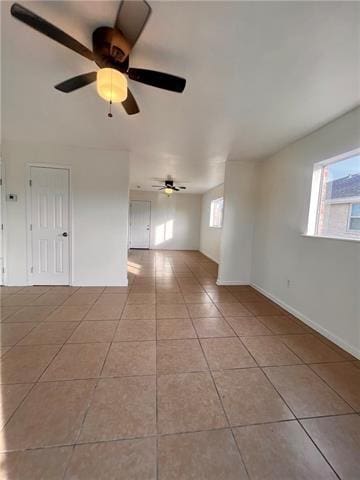 5227-5229 Cannes St, New Orleans, LA 70129 - unfurnished room featuring light tile patterned floors and ceiling fan