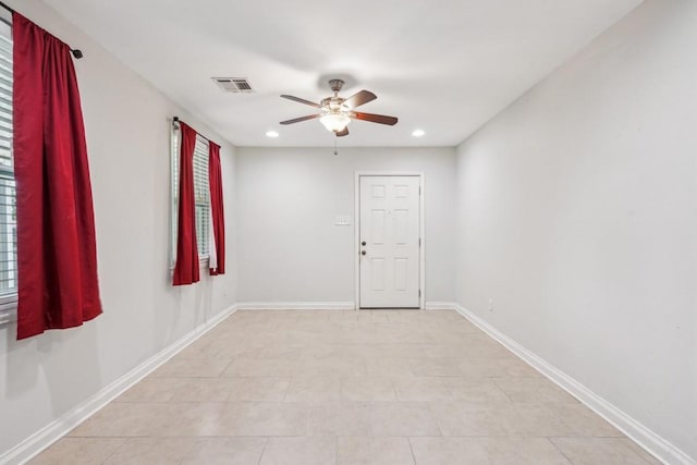 unfurnished room featuring baseboards, a ceiling fan, recessed lighting, and visible vents
