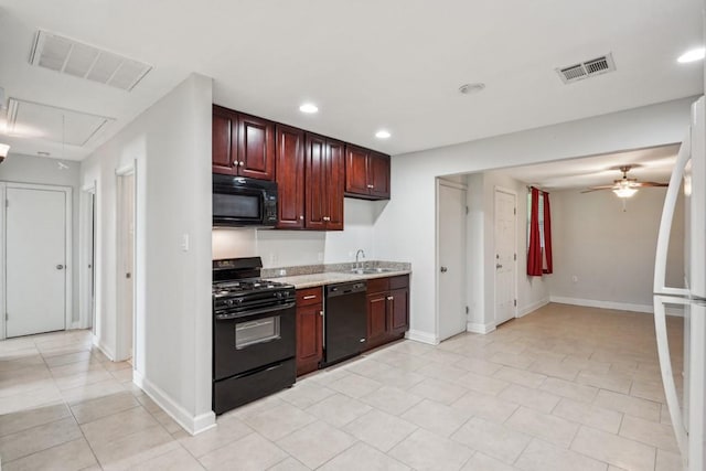 kitchen with visible vents, recessed lighting, and black appliances