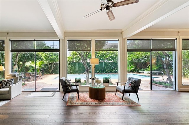 2100 Jefferson Ave, New Orleans, LA 70115 - sunroom / solarium with a wooden deck, plenty of natural light, wood-type flooring, ornamental molding, and beam ceiling