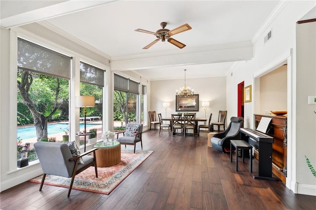 2100 Jefferson Ave, New Orleans, LA 70115 - living area with ornamental molding, dark wood finished floors, a ceiling fan, a chandelier, and baseboards
