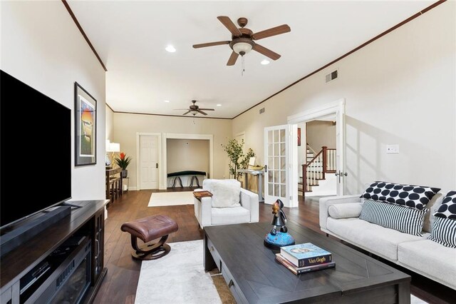 2100 Jefferson Ave, New Orleans, LA 70115 - living area featuring wood finished floors, ceiling fan, stairs, recessed lighting, and french doors
