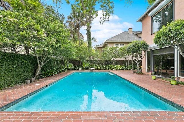 2100 Jefferson Ave, New Orleans, LA 70115 - view of pool featuring a patio area and a fenced backyard