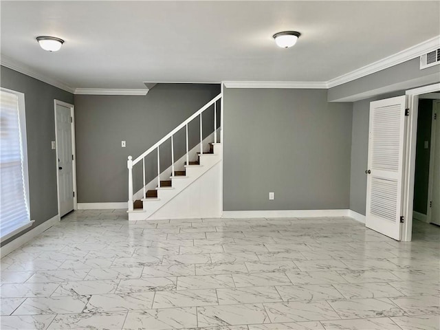2644 Ramsey Dr, New Orleans, LA 70131 - below grade area with crown molding, baseboards, stairs, and marble finish floor