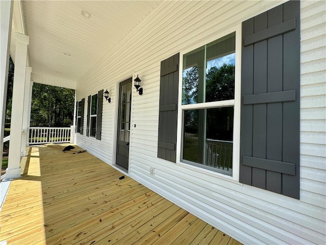 deck with covered porch