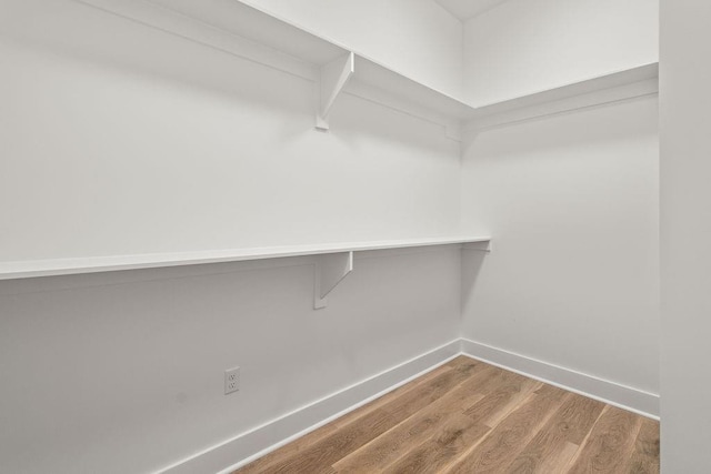 71131 Sanders St, Abita Springs, LA 70420 - walk in closet with wood finished floors