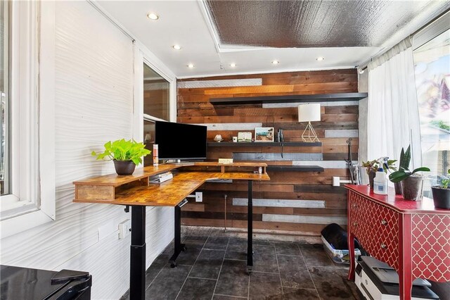 7020 Wilty St, Metairie, LA 70003 - home office with wood walls, recessed lighting, and dark tile patterned flooring
