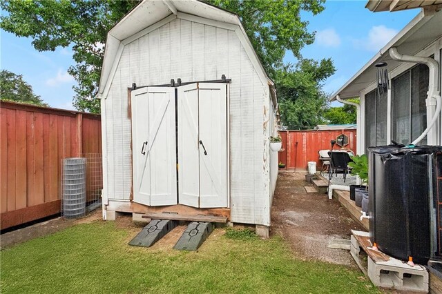 7020 Wilty St, Metairie, LA 70003 - view of shed with a fenced backyard