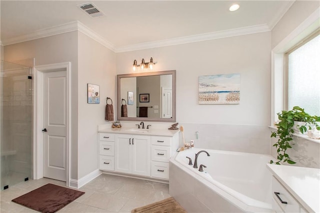 full bathroom featuring vanity, ornamental molding, and a garden tub