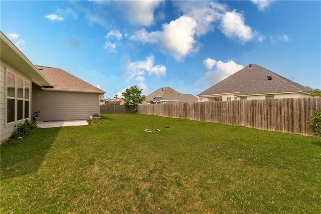 view of yard with a fenced backyard and a patio area