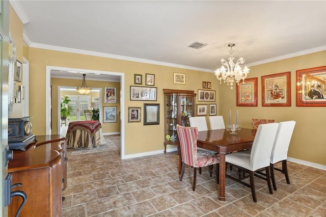 421 Oaklawn Dr, Metairie, LA 70005 - dining area with baseboards, a wood stove, a chandelier, and ornamental molding