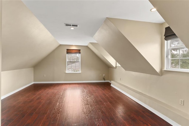 421 Oaklawn Dr, Metairie, LA 70005 - additional living space featuring lofted ceiling, hardwood / wood-style flooring, baseboards, and visible vents
