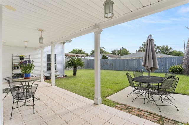 421 Oaklawn Dr, Metairie, LA 70005 - view of patio featuring outdoor dining area and a fenced backyard