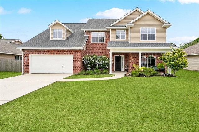 view of front of house with fence, brick siding, concrete driveway, a front yard, and a shingled roof