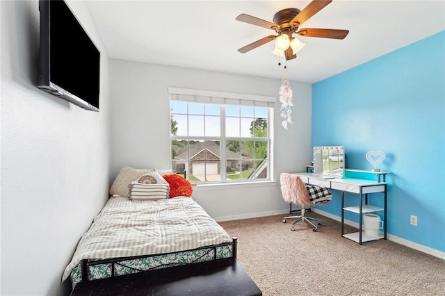 233 Arian Ln, Covington, LA 70433 - carpeted bedroom featuring baseboards and ceiling fan