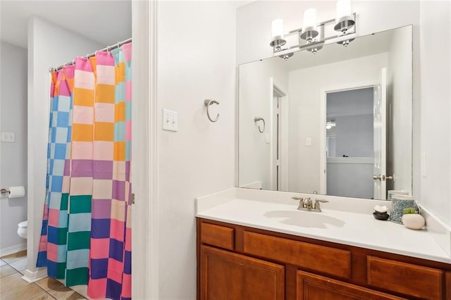 full bath featuring vanity, toilet, a shower with shower curtain, and tile patterned flooring