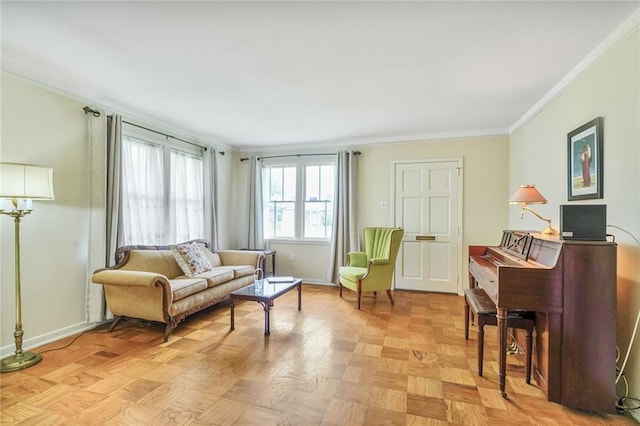 living room with baseboards and crown molding