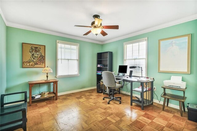 office space featuring ceiling fan, crown molding, baseboards, and a healthy amount of sunlight