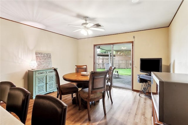 713 Lydia Ct, Marrero, LA 70072 - dining room with ceiling fan, light wood-style flooring, and visible vents