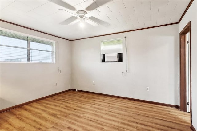 713 Lydia Ct, Marrero, LA 70072 - spare room featuring light wood-type flooring, ornamental molding, baseboards, and a ceiling fan