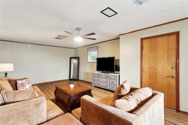 713 Lydia Ct, Marrero, LA 70072 - living room with crown molding, baseboards, ceiling fan, and light wood-style floors