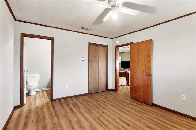 713 Lydia Ct, Marrero, LA 70072 - unfurnished bedroom with baseboards, ornamental molding, light wood-style flooring, and visible vents