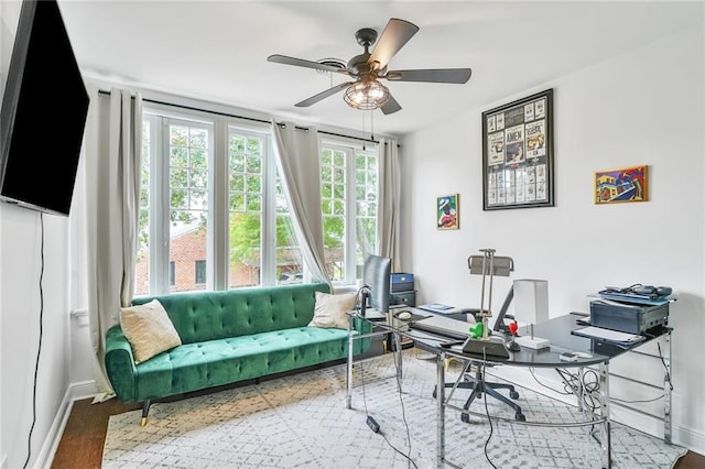 3031 Jena St, New Orleans, LA 70125 - office with baseboards, a ceiling fan, and wood finished floors