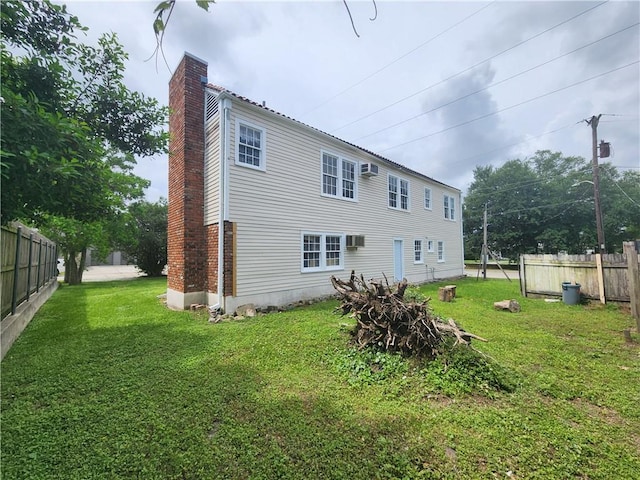 6417 Fleur De Lis Dr, New Orleans, LA 70124 - rear view of house with a chimney