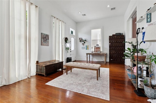3605 Constance St, New Orleans, LA 70115 - living area featuring recessed lighting, visible vents, and wood finished floors