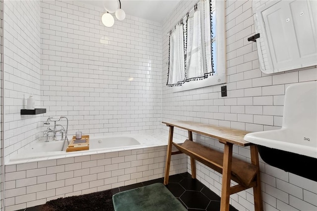 3605 Constance St, New Orleans, LA 70115 - full bath with tile walls, a relaxing tiled tub, and tile patterned floors