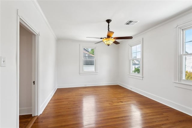 5512 S Tonti St, New Orleans, LA 70125 - spare room with visible vents and a healthy amount of sunlight